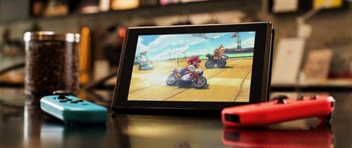 Consola Nintendo Switch con un par de Joy-Cons inalámbricos V3 en rojo y azul neón - Imagen de 5